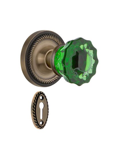 Rope Rosette Mortise Lock Set with Colored Fluted Crystal Glass Knobs Emerald in Antique Brass.